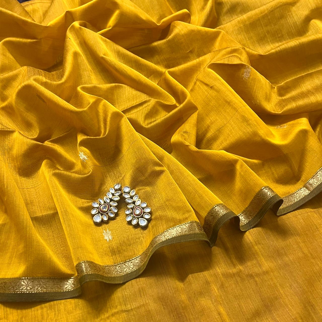 Mustard and pink maheshwari saree with flower bootis all over