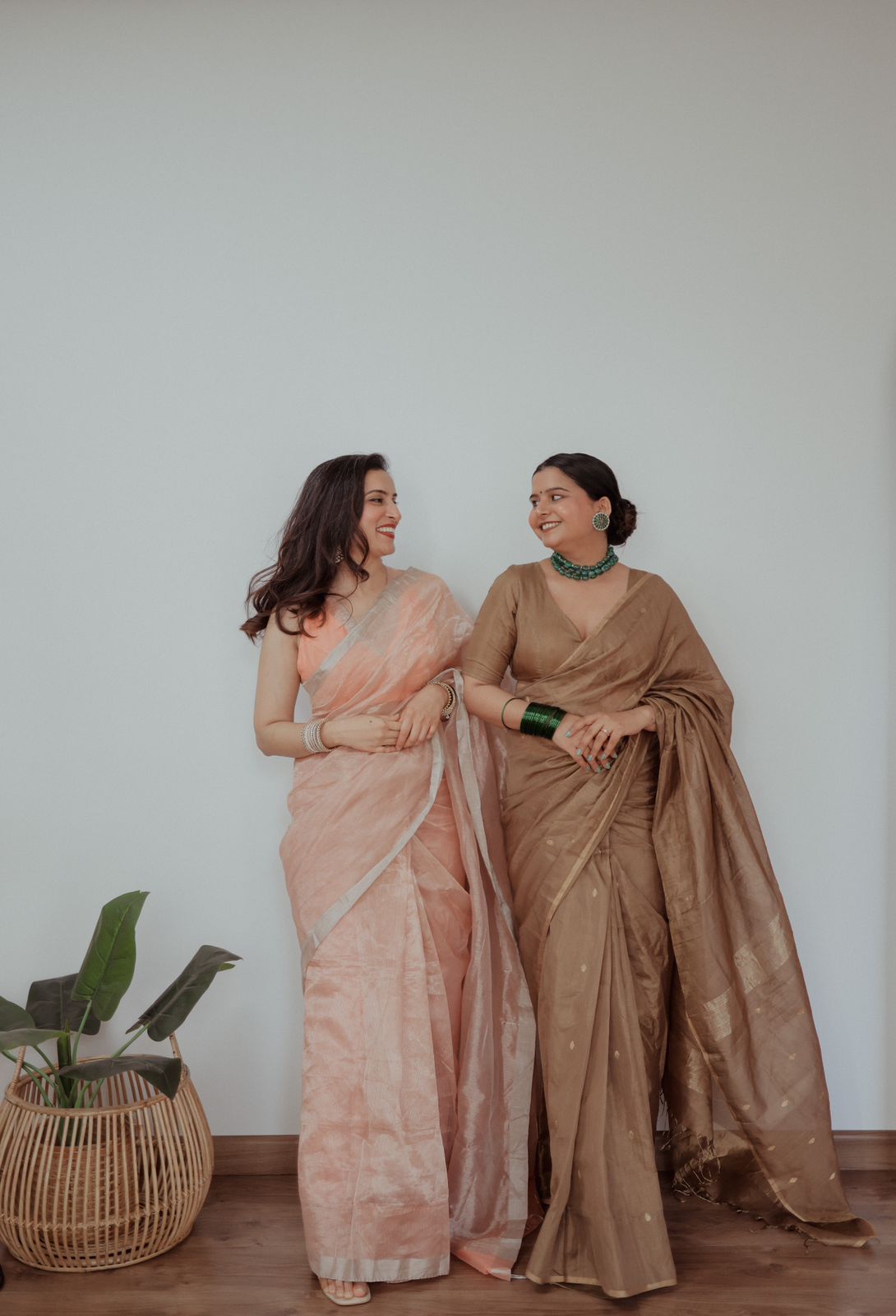 Peachish Pink Maheshwari saree with Silver Zari lines all over