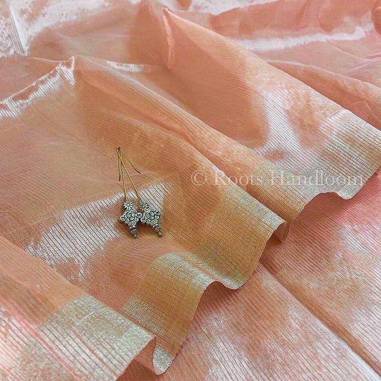 Peachish Pink Maheshwari saree with Silver Zari lines all over