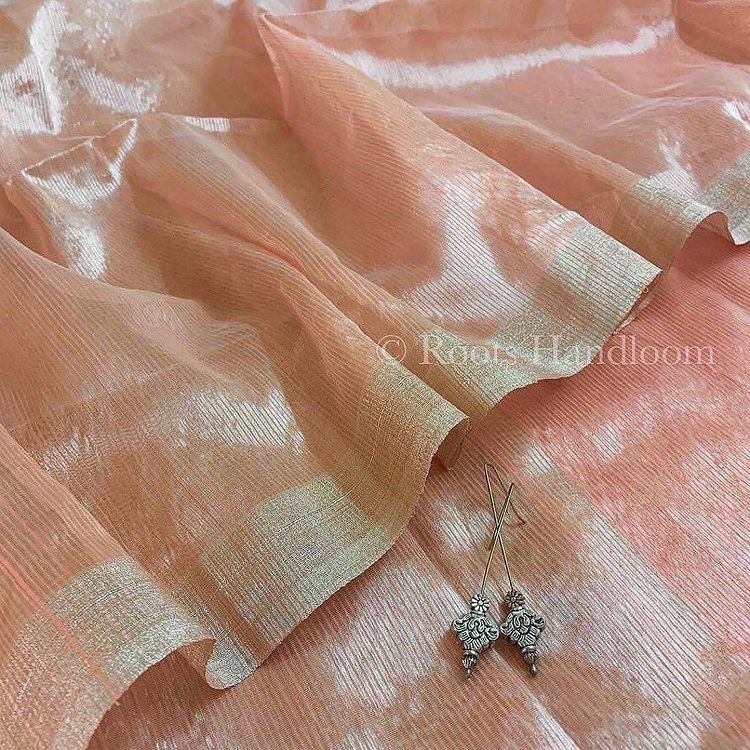 Peachish Pink Maheshwari saree with Silver Zari lines all over