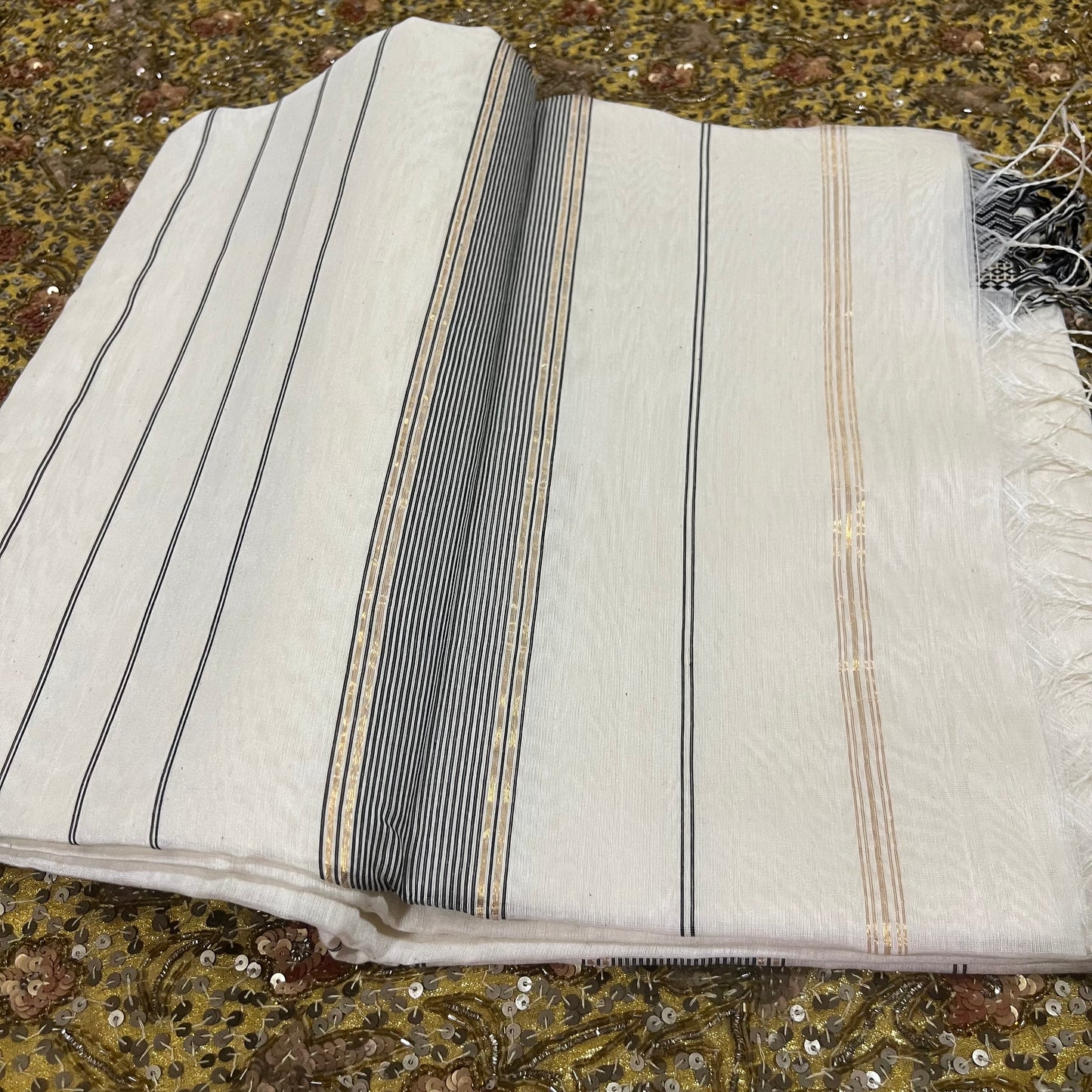 White and Black Maheshwari saree with resham border and Threadwork on pallu