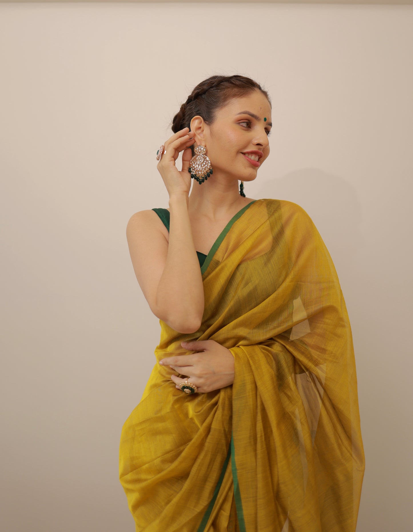 Mustard and green maheshwari saree