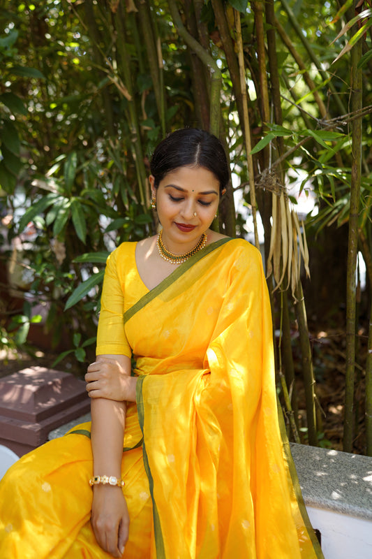 Yellow and green chanderi silk saree with flower bootis all over