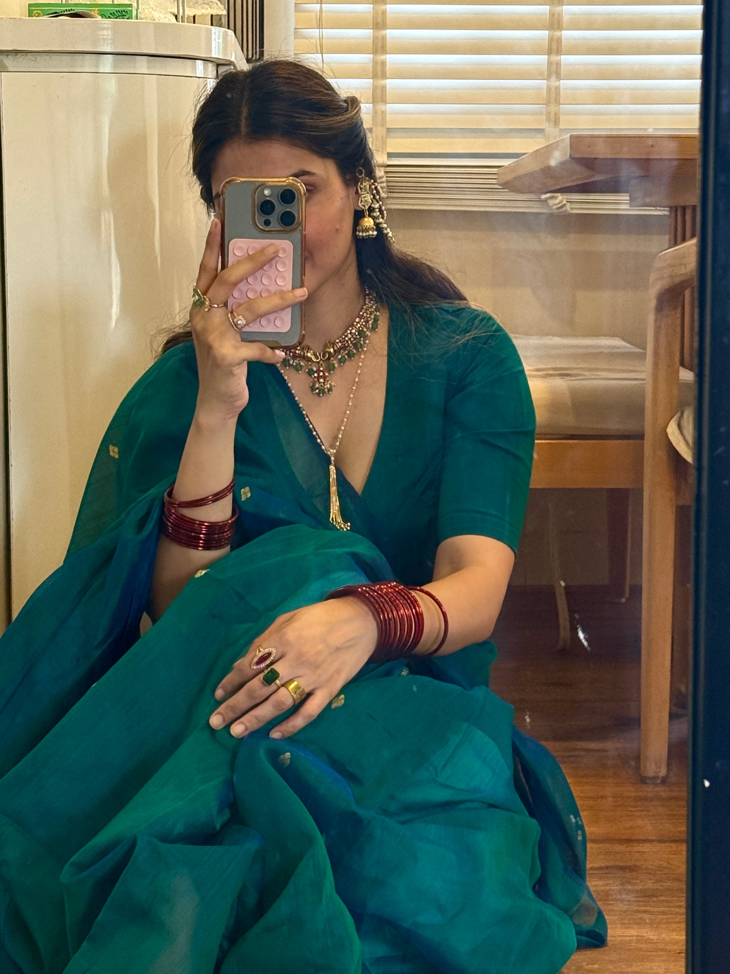 Peacock green and blue dual tone Maheshwari saree with zari bootis all over