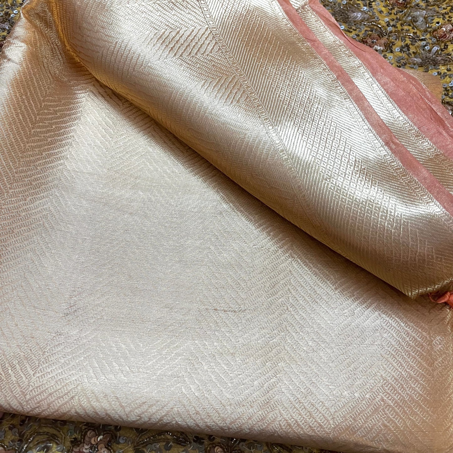 Champagne gold Banarasi silk saree with zari pattern all over