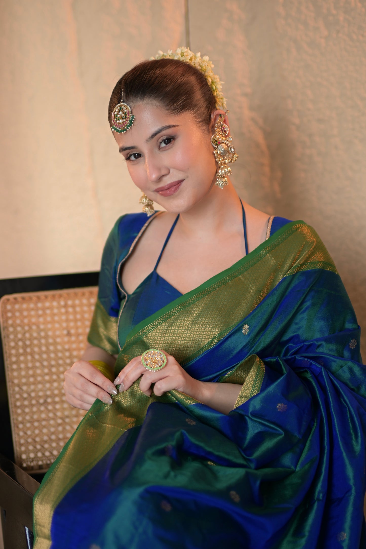 Peacock blue and green dual tone Maheshwari silk saree with zari bootis all over