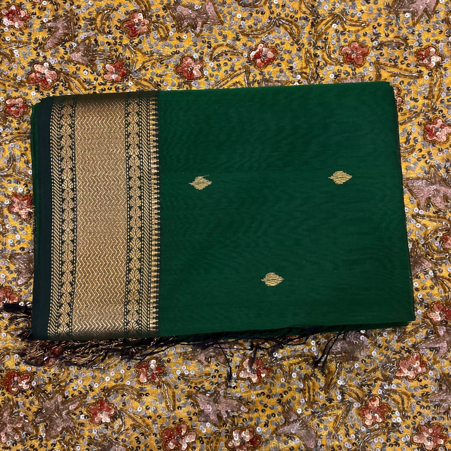 Bottle green Maheshwari saree with zari bootis and zari border
