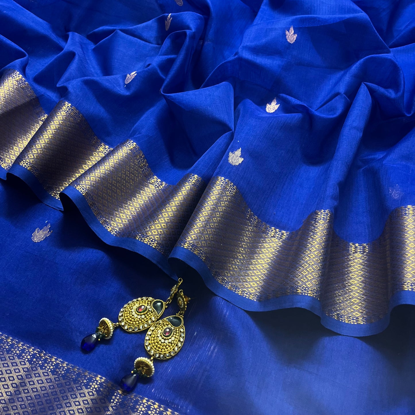 Cobalt blue Maheshwari saree with flower bootis all over