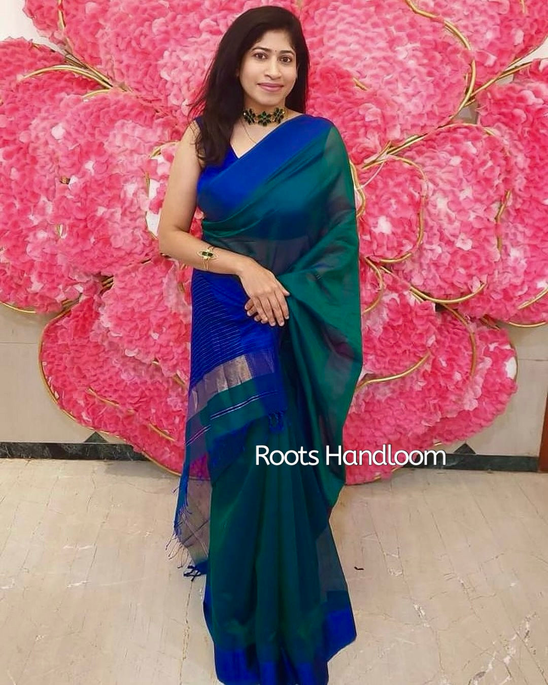Peacock green and blue dual tone Maheshwari saree with resham border