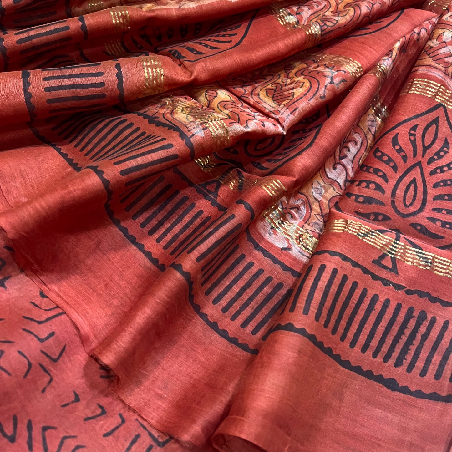 Rust Maheshwari saree with ajrakh print all over