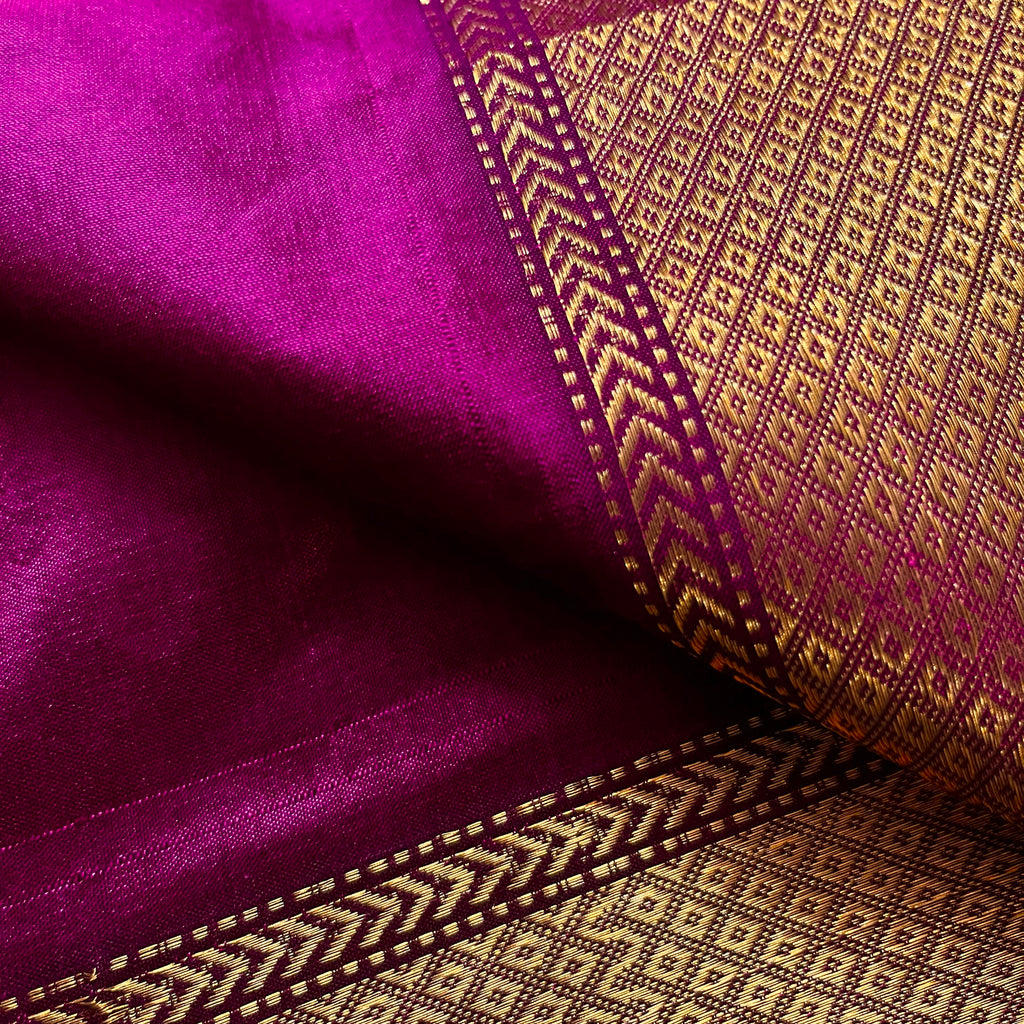 Magenta maheshwari silk saree with zari bootis all over