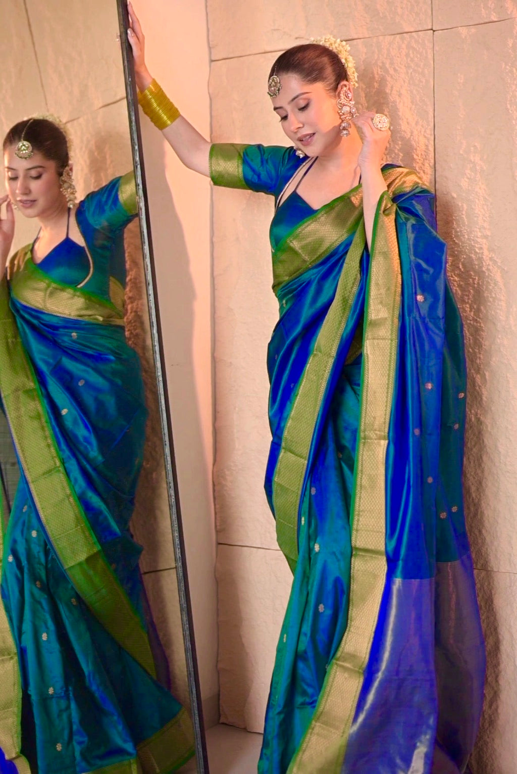 Peacock blue and green dual tone Maheshwari silk saree with zari bootis all over