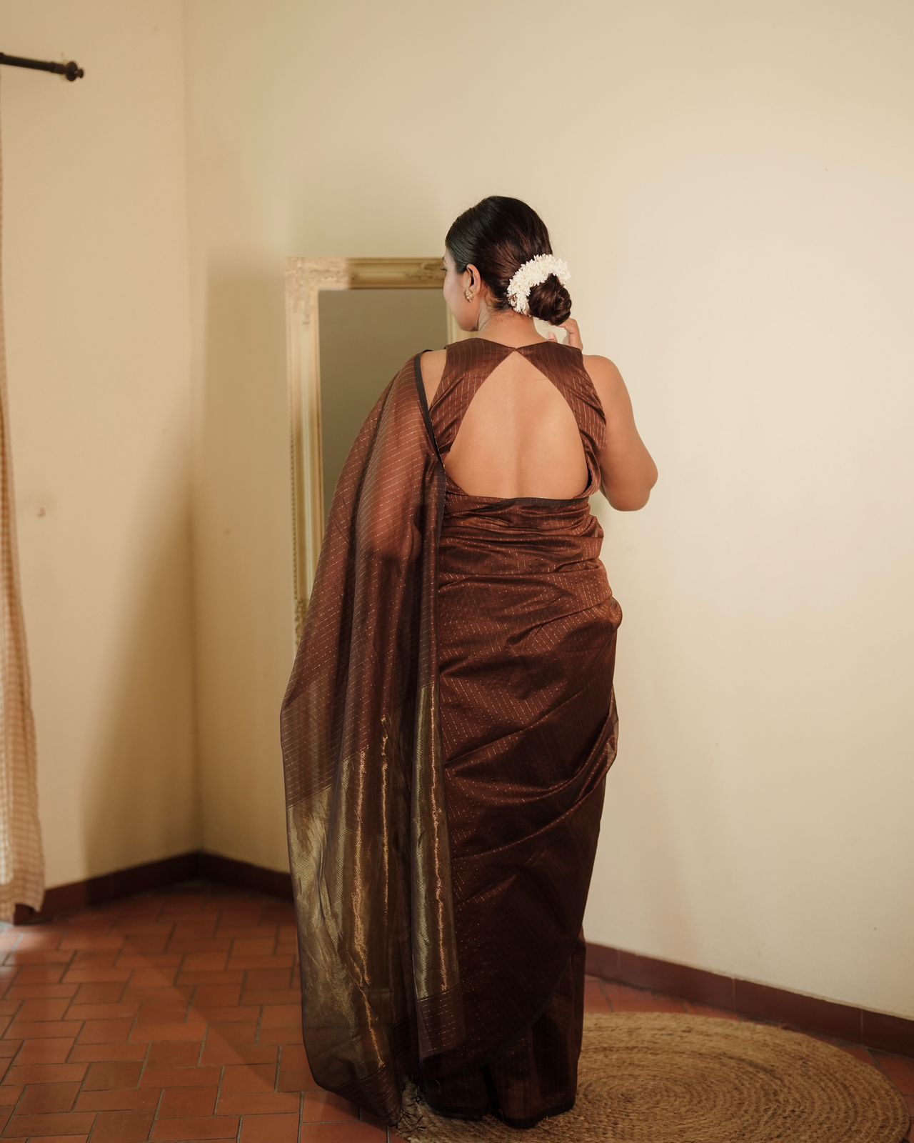 Chocolate brown Maheshwari saree with zari lines all over