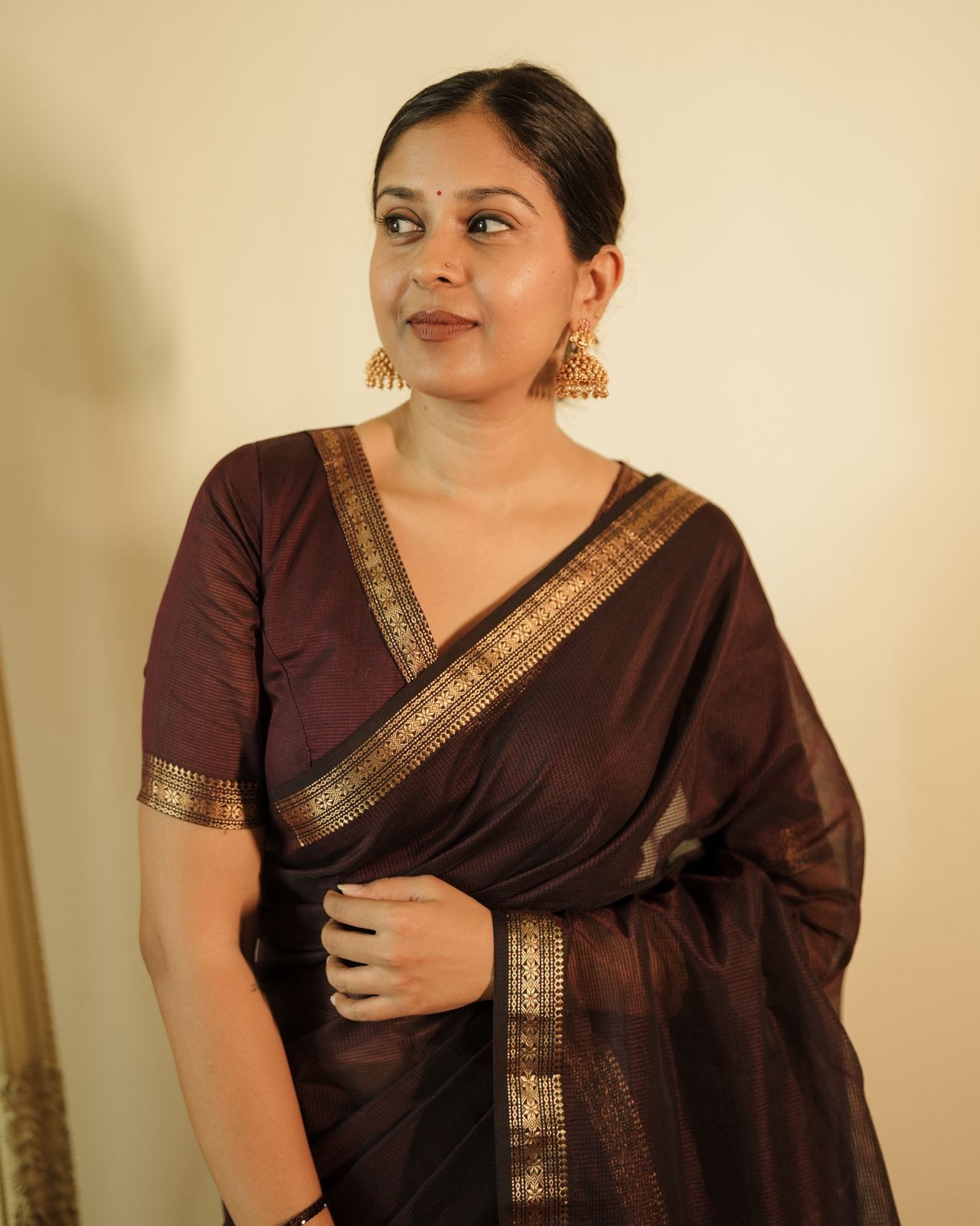 Mahoganay Maheshwari saree with zari border and zari lines on pallu