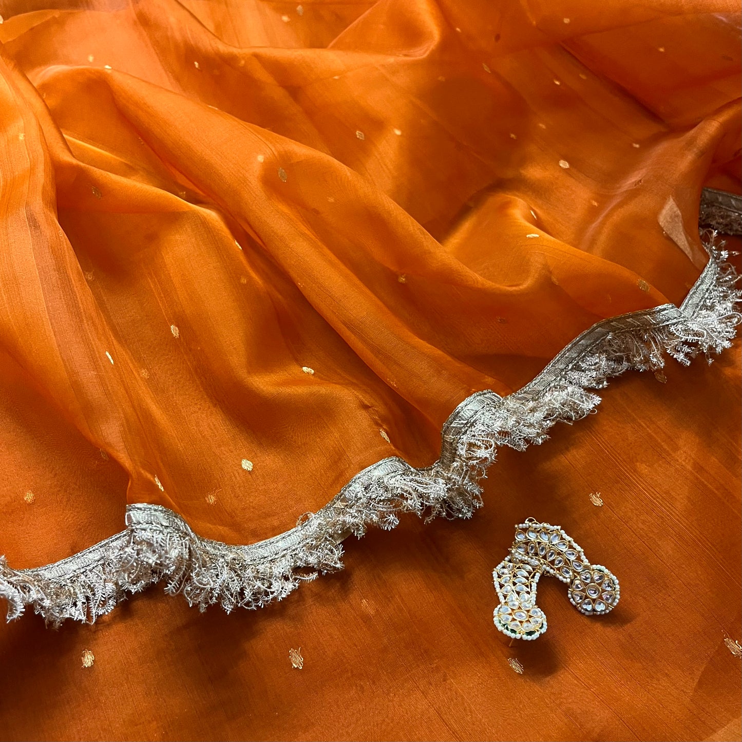 Burnt Orange Chanderi silk saree with zari bootis all over