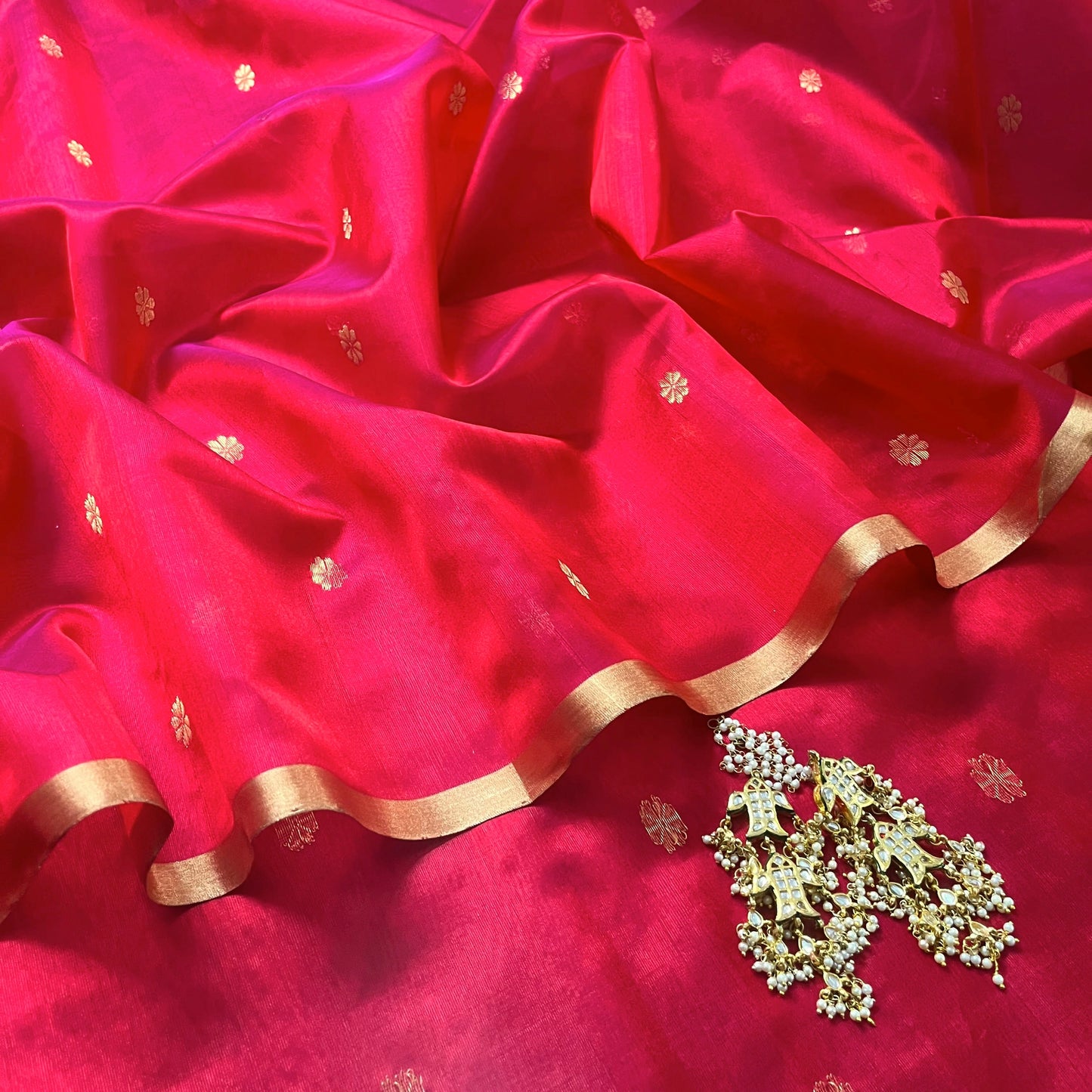 Red and pink dual tone Chanderi silk saree with flower bootis all over
