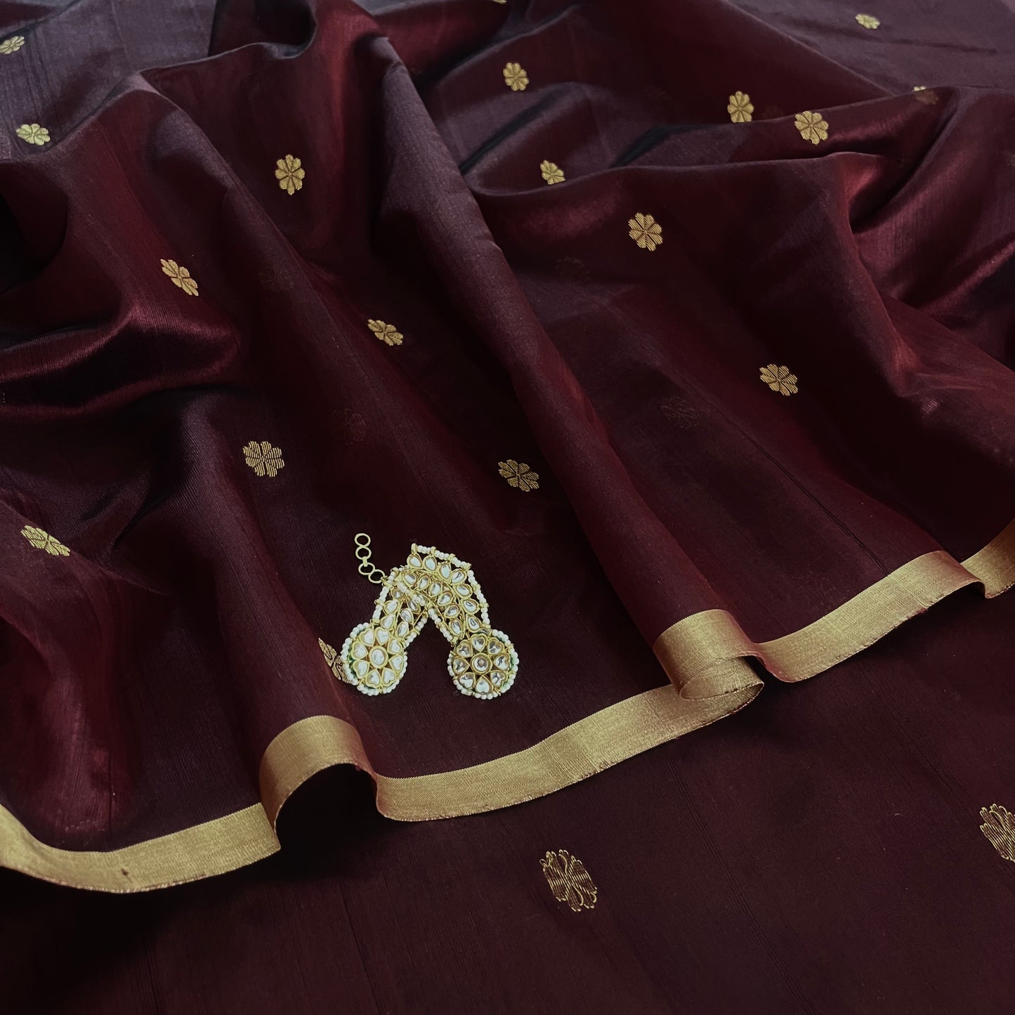 Mahogany Chanderi silk saree with flower bootis all over
