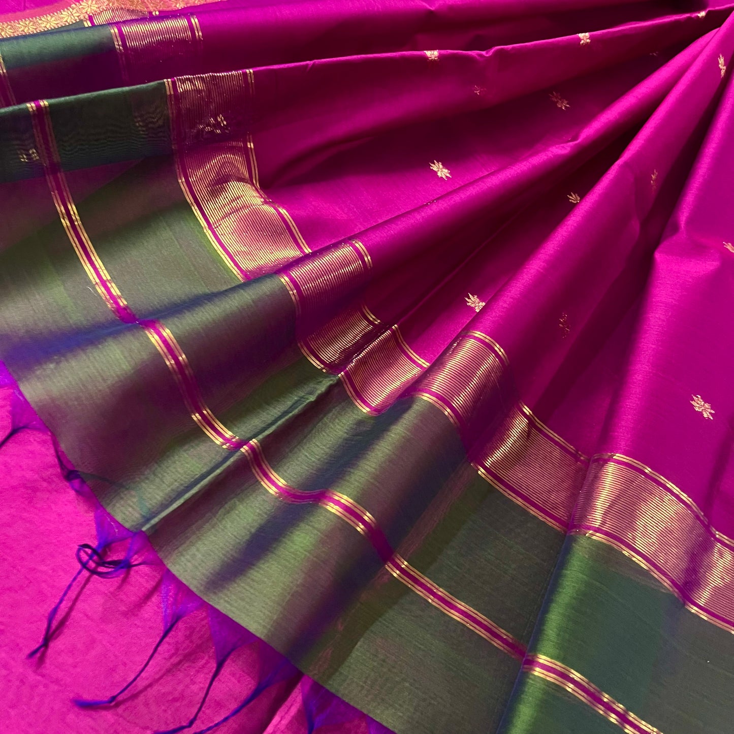 Green and pink Maheshwari saree with flower bootis all over