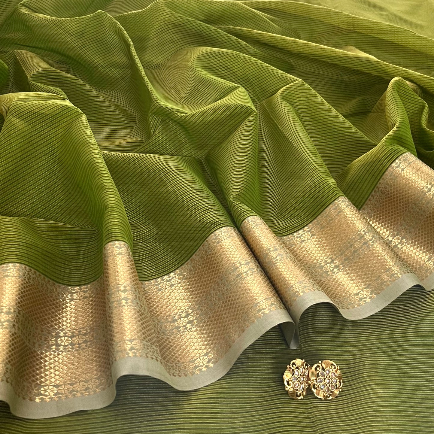 Moss green Maheshwari saree with zari border