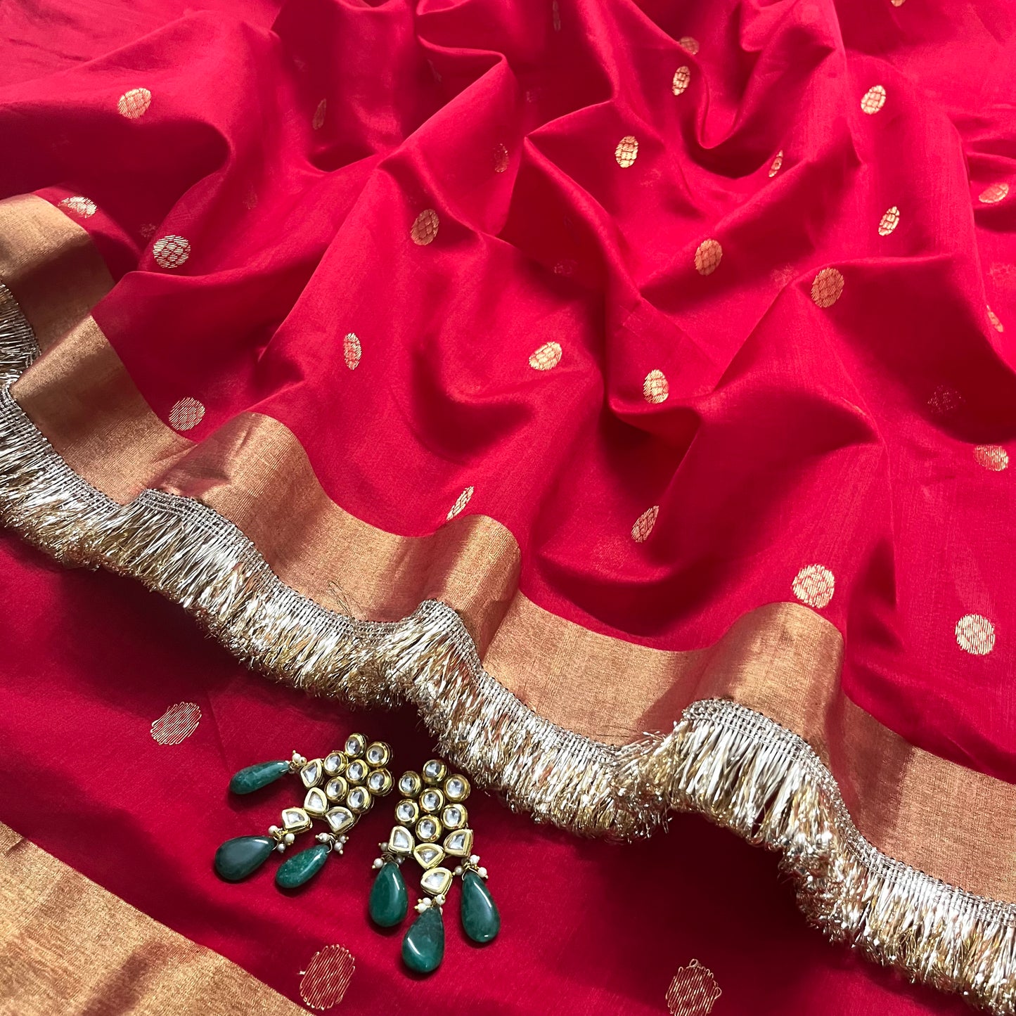 Red Chanderi saree with zari bootis and zari border all over