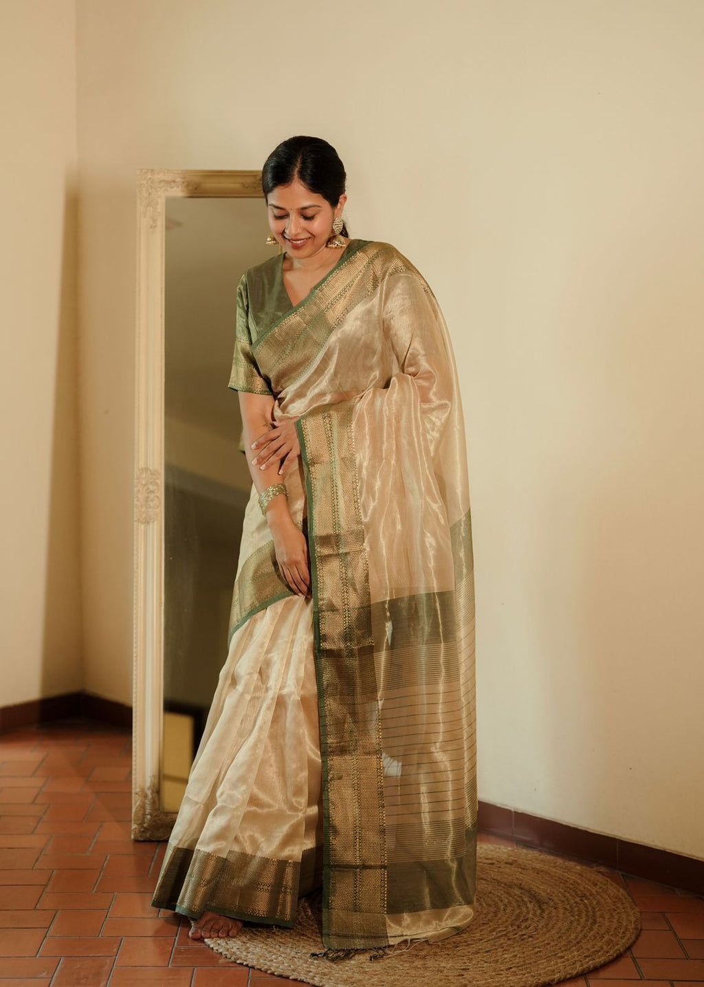 Cream Gold and green Maheshwari tissue silk saree with zari pattern on pallu