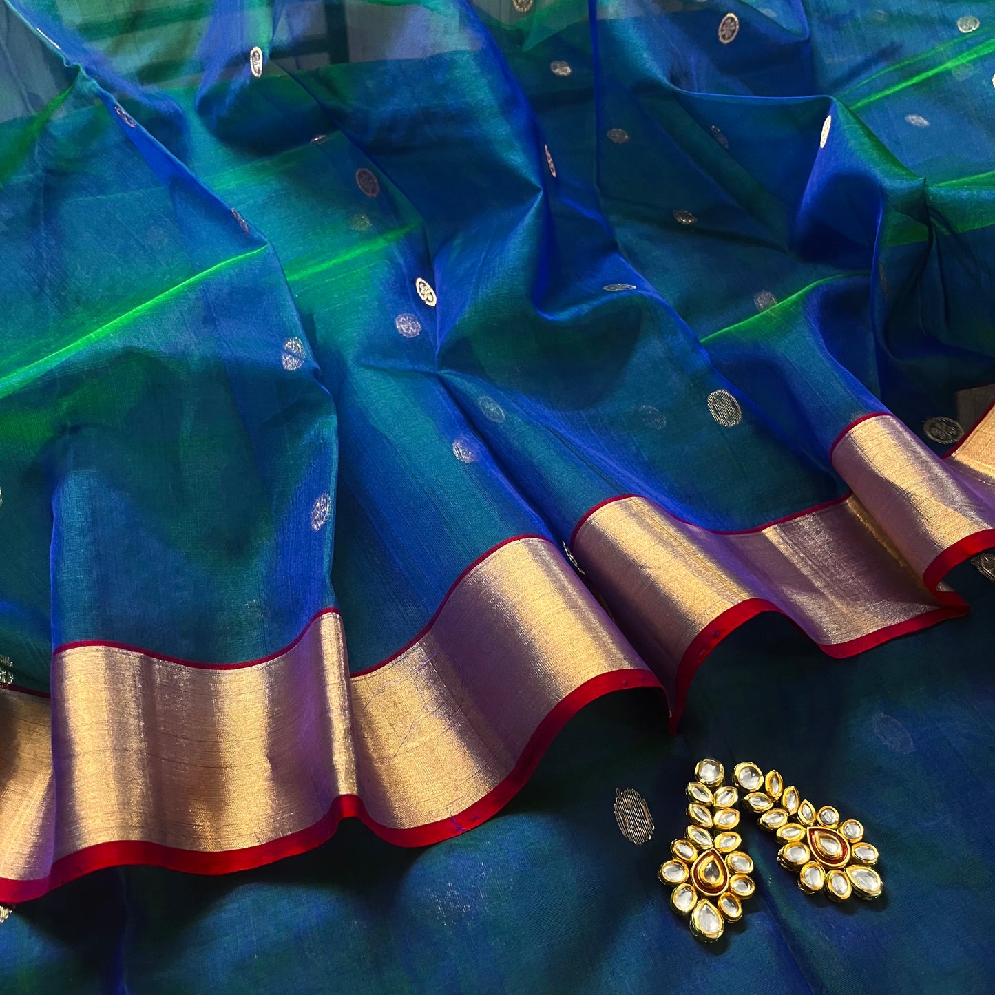 Peacock blue dual tone Chanderi silk saree with zari motifs on pallu