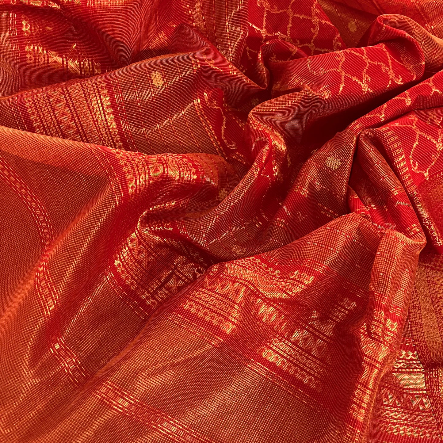 Red and gold Maheshwari silk saree with zari jaal work on pallu