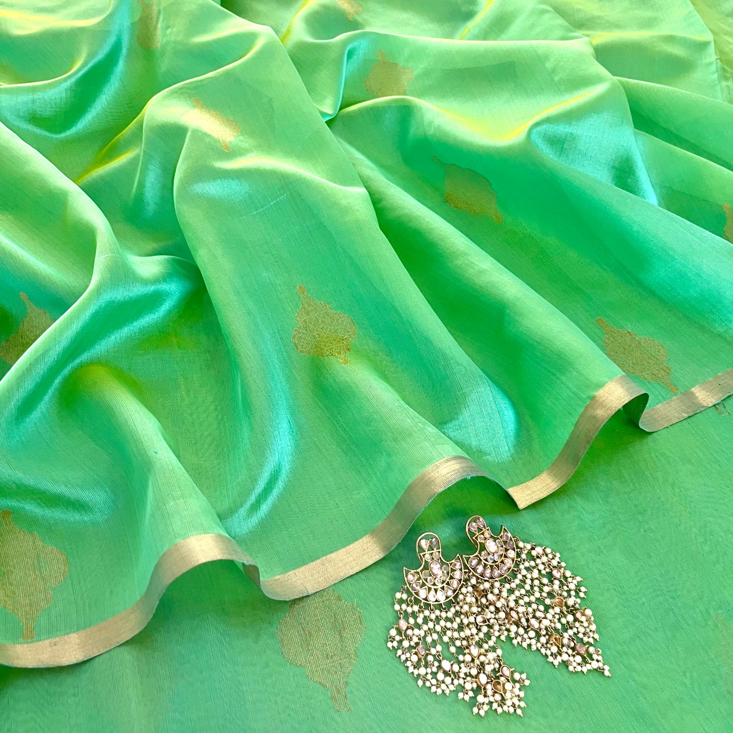Sea green dual tone Chanderi silk saree with jhoomar motifs all over