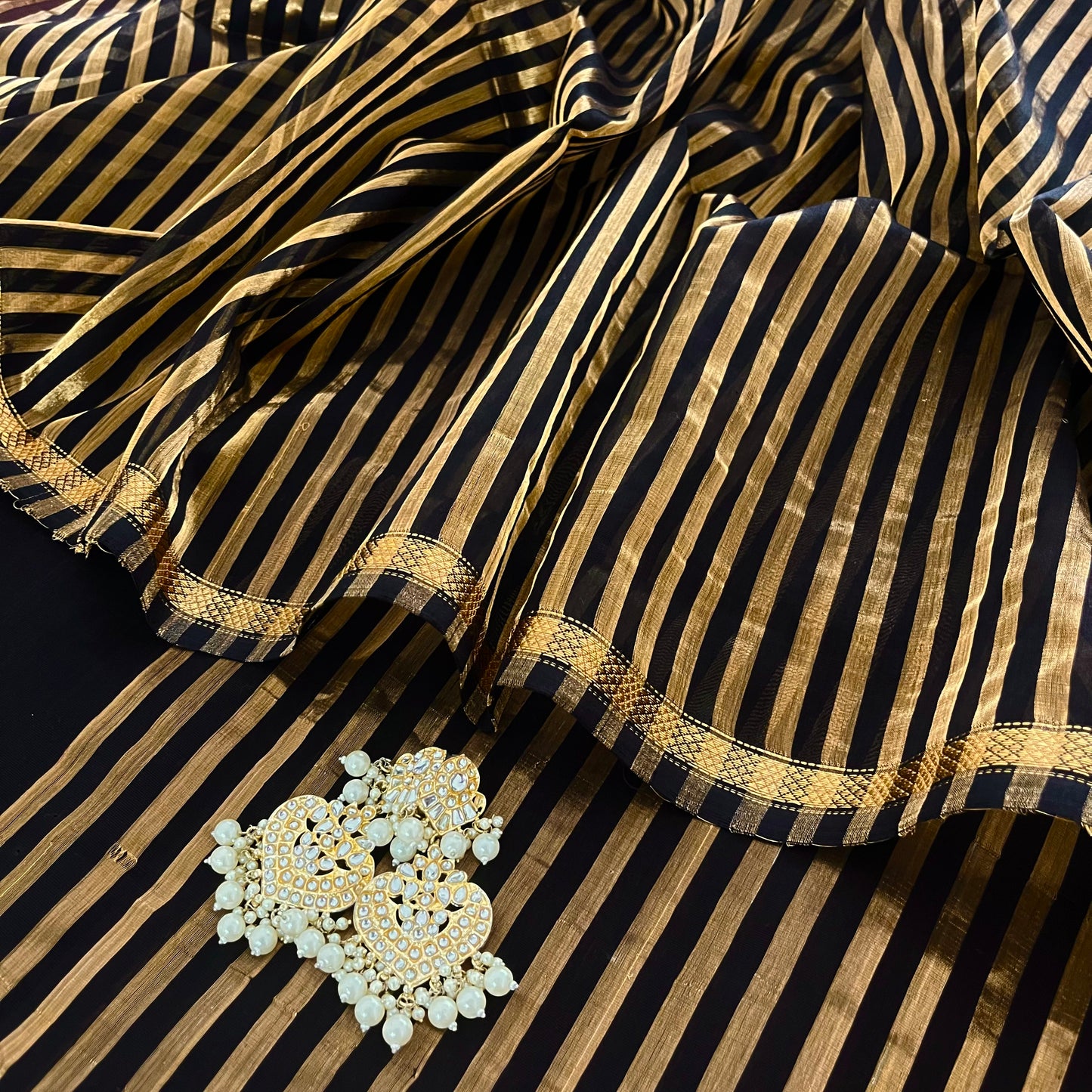 Black Maheshwari saree with zari stripes all over