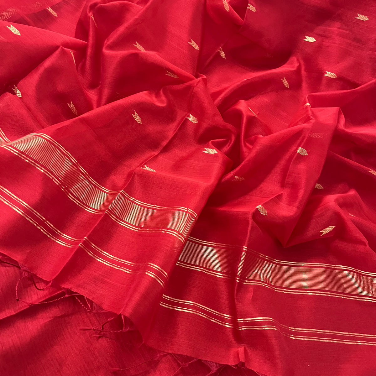 Red maheshwari saree with zari border & zari bootis all over