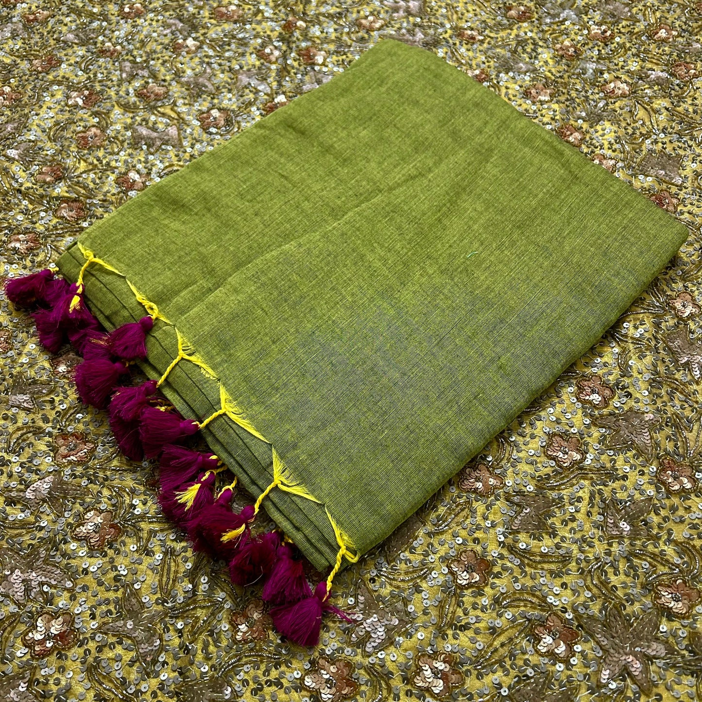 Olive green and pink mulmul saree