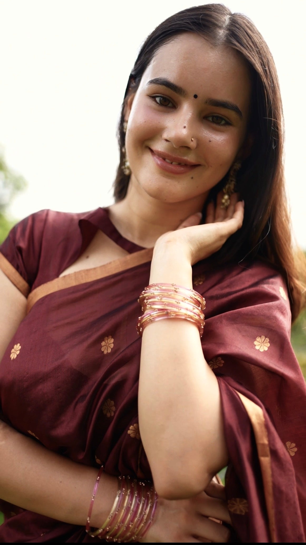 Mahogany Chanderi silk saree with flower bootis all over