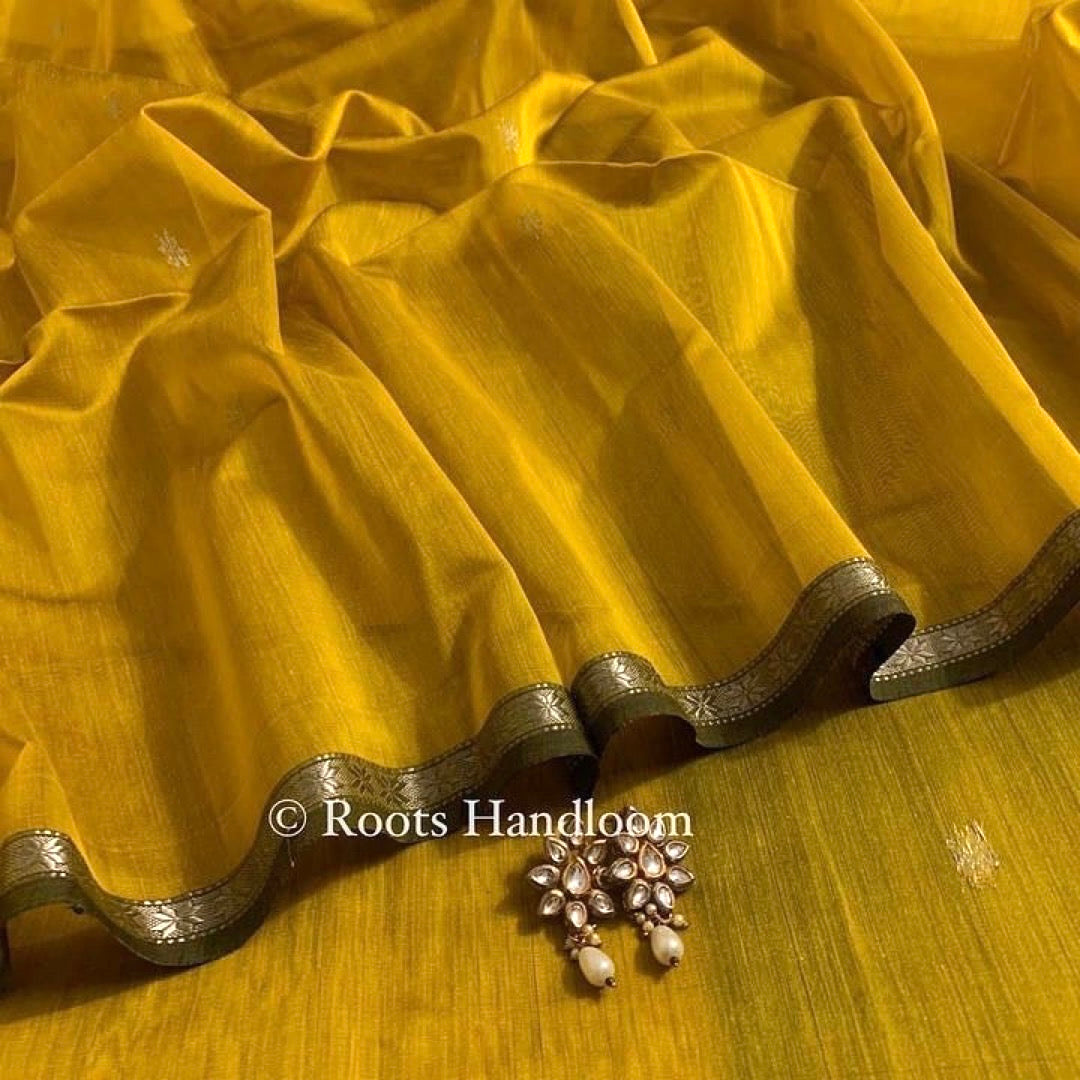 Mustard & green Maheshwari saree with flower bootis all over