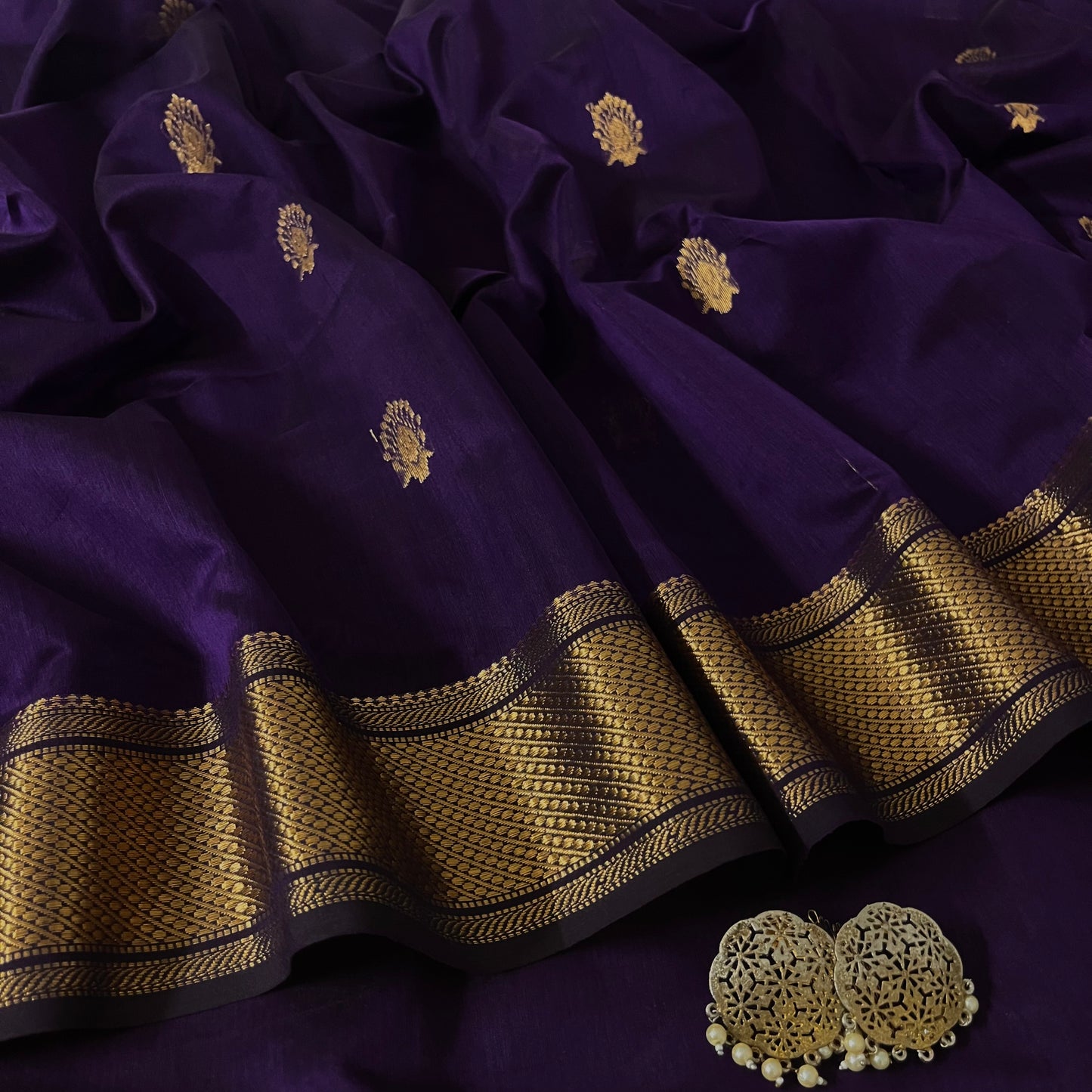Dark purple Maheshwari saree with zari motifs all over