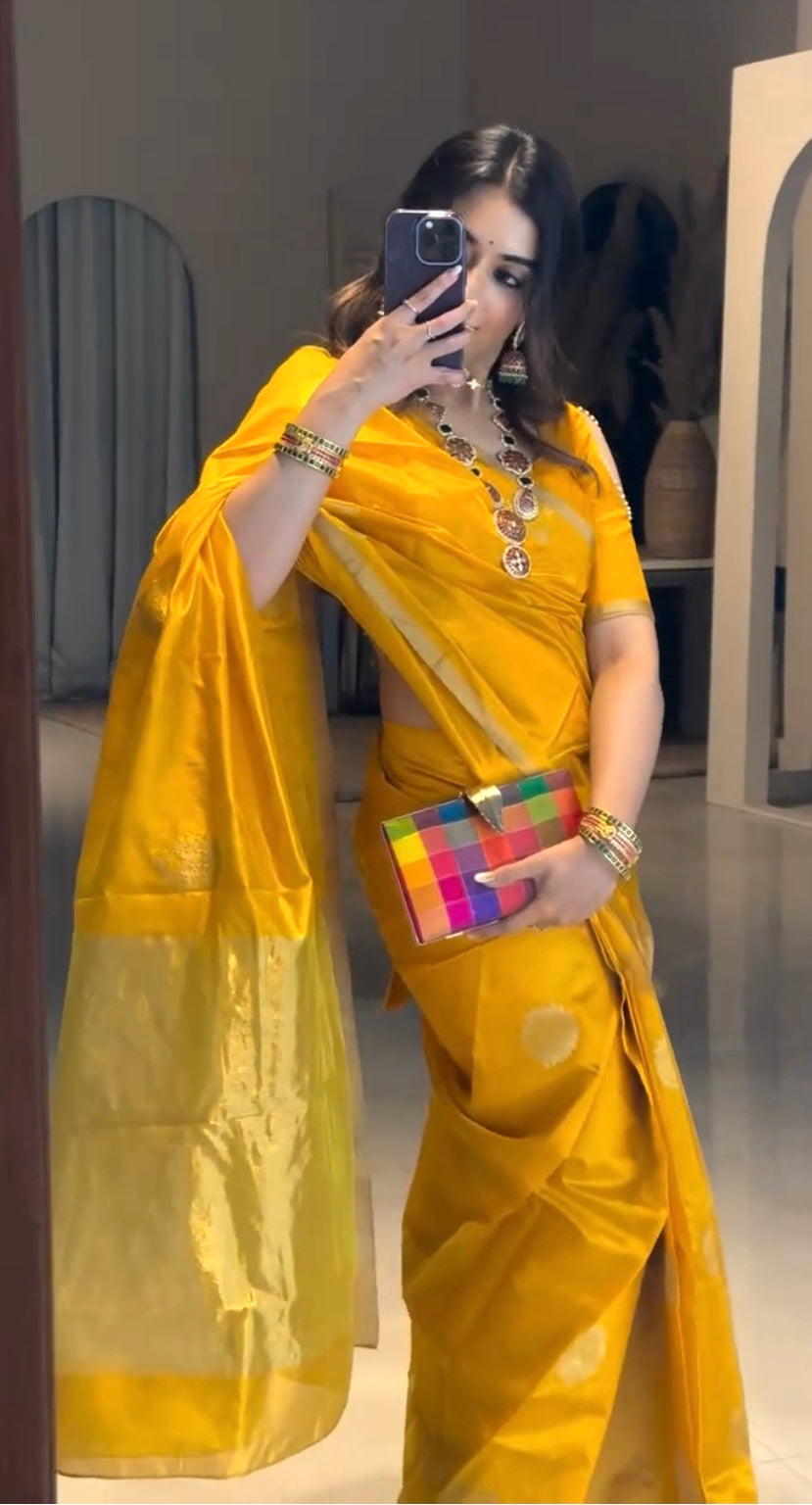 Yellow chanderi silk saree with mor motifs all over