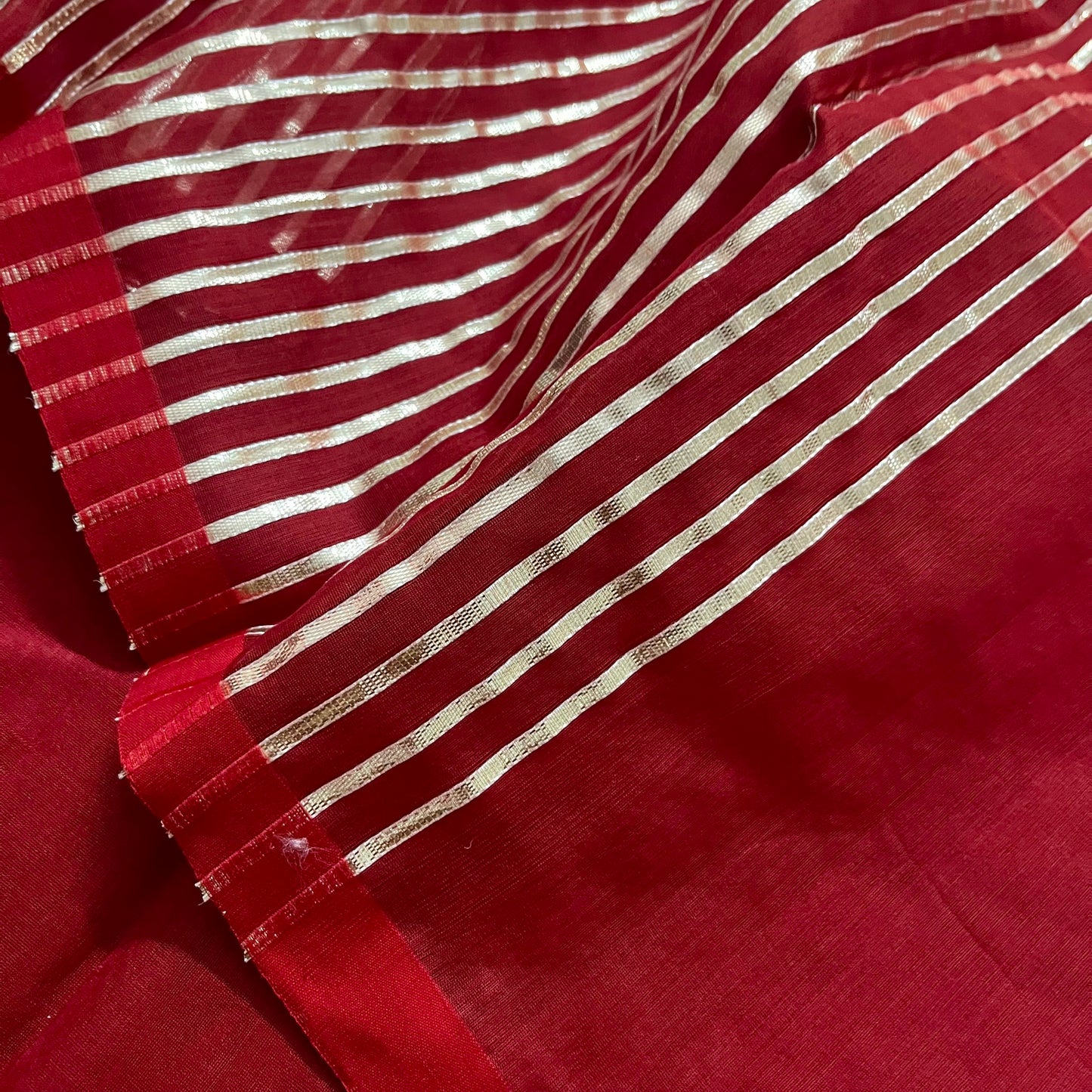 Deep red chanderi saree with intricate gota work all over