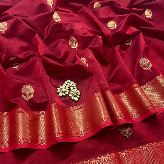 Deep red maheshwari saree with flower motifs all over