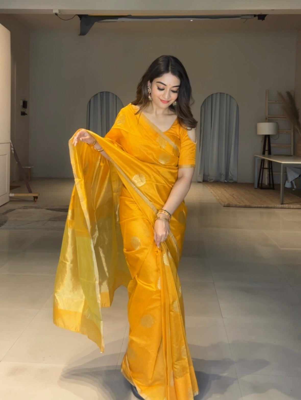 Yellow chanderi silk saree with mor motifs all over