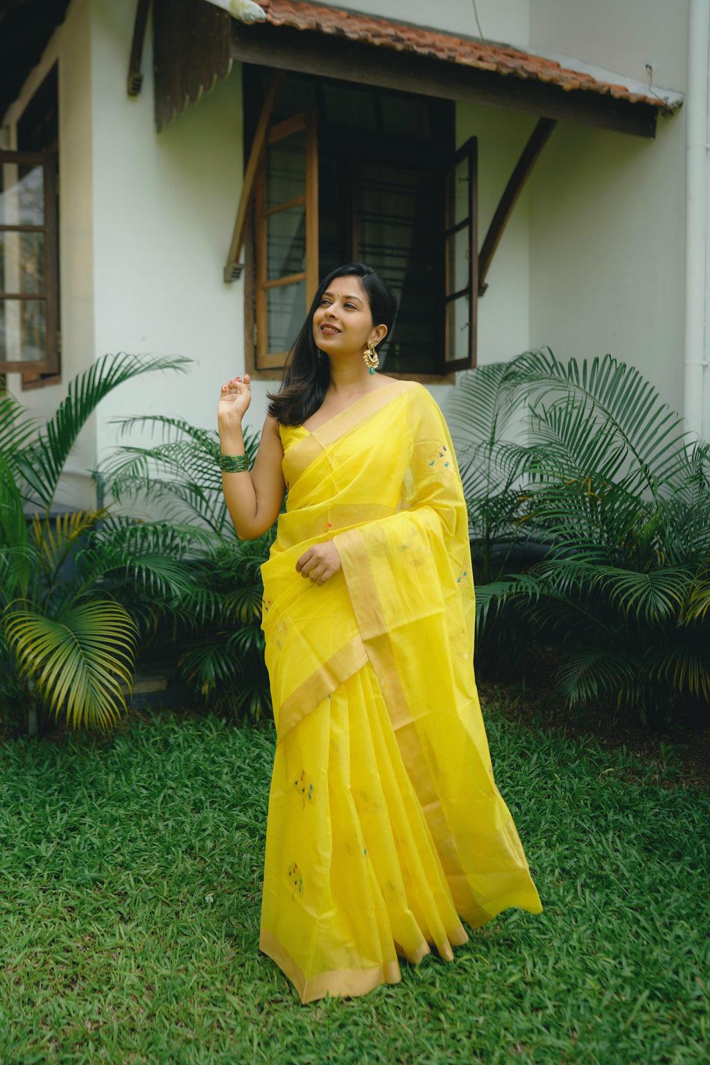 Yellow Chanderi saree with birds on tree motifs all over