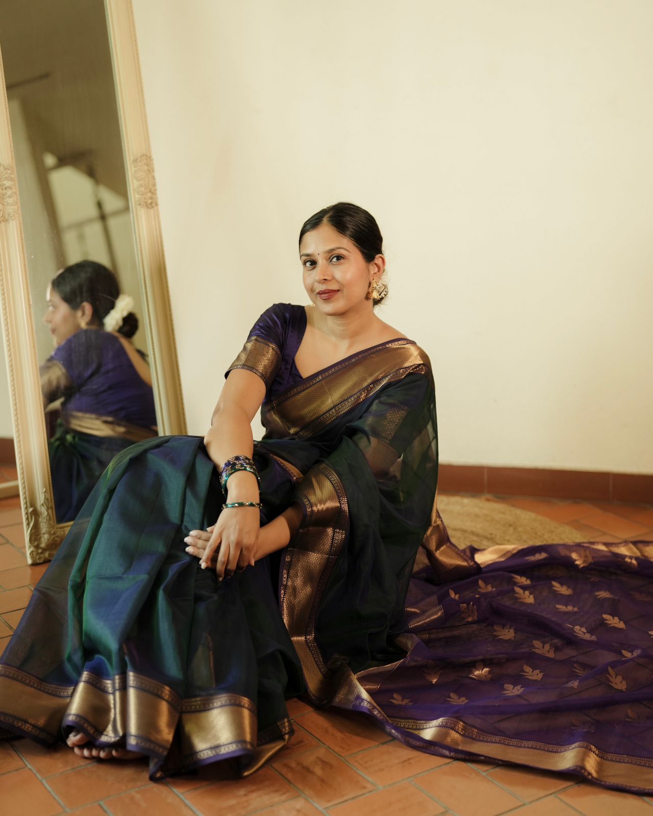 Peacock and purple dual tone Maheshwari saree with flower motifs on pallu