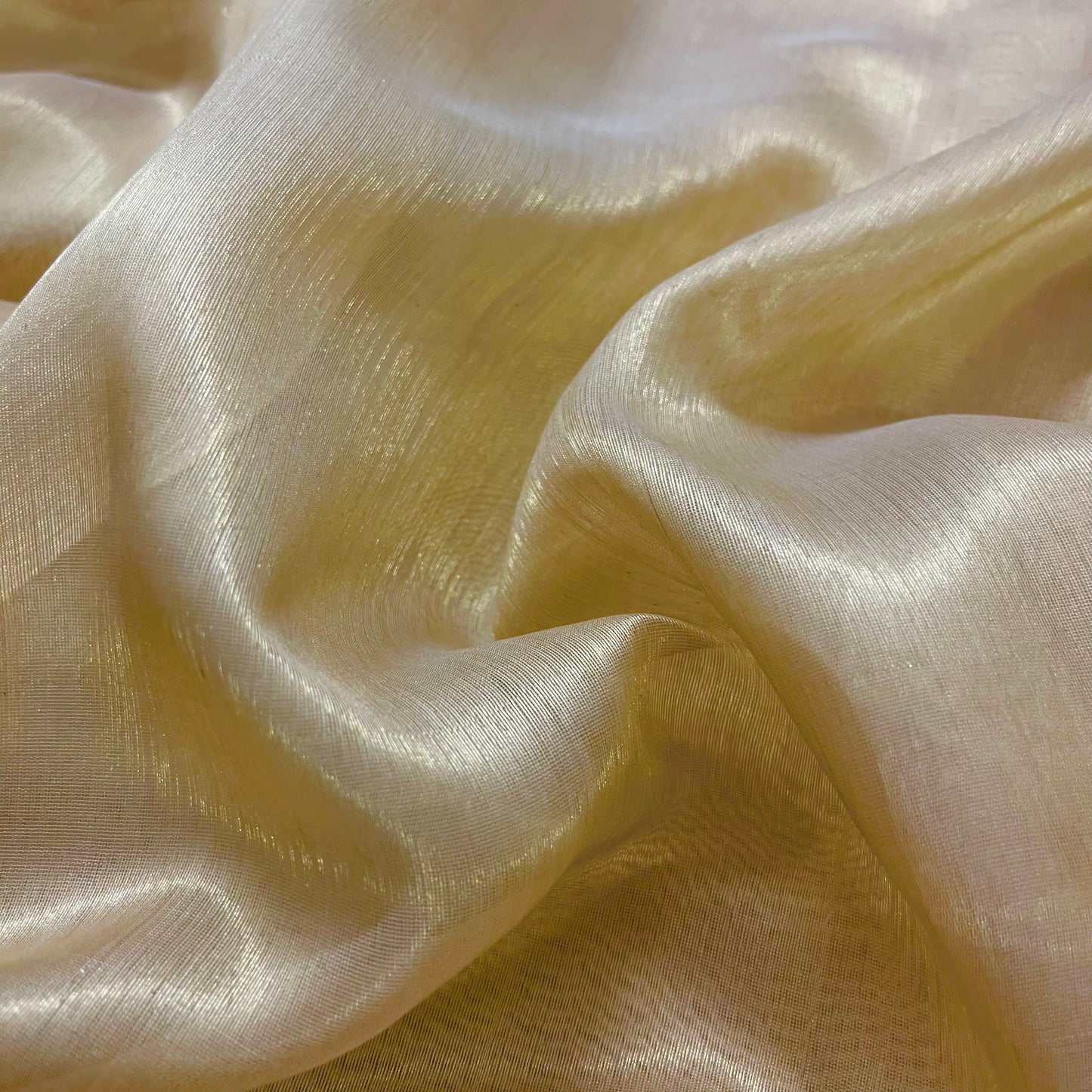 Gold and green Maheshwari tissue silk saree with zari pattern on pallu