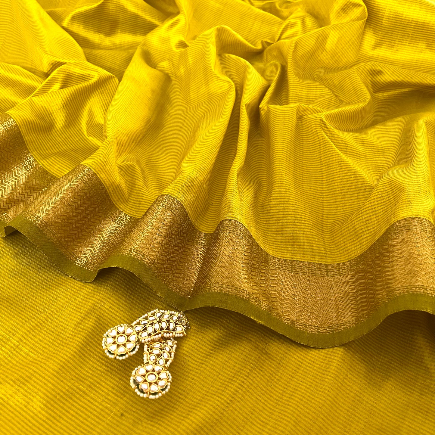 Corn yellow Maheshwari silk saree with zari border