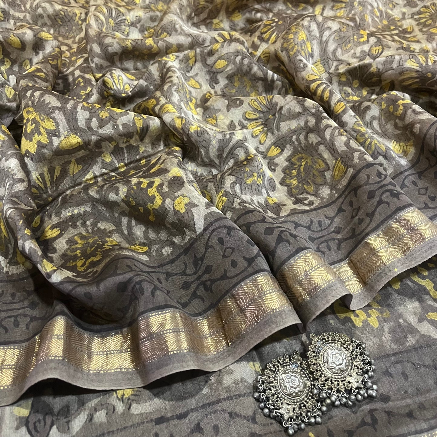 Grey Maheshwari saree with ajrakh print all over