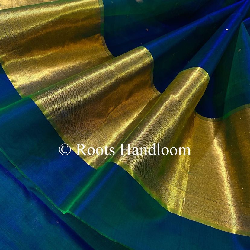 Peacock blue and green dual tone Chanderi organza silk saree with zari bootis all over
