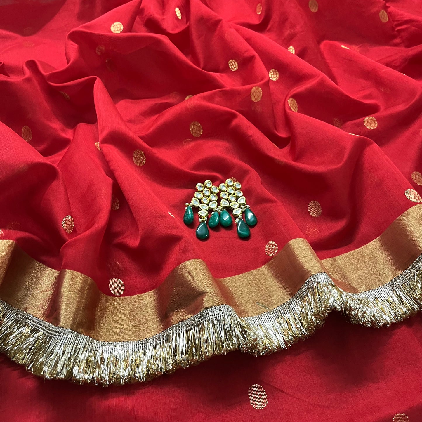 Red Chanderi saree with zari bootis and zari border all over
