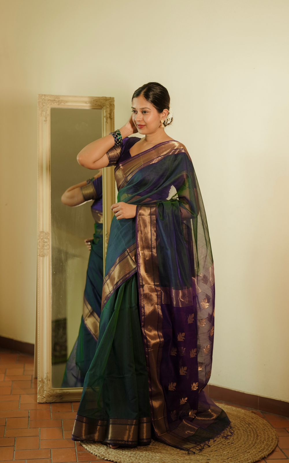 Peacock and purple dual tone Maheshwari saree with flower motifs on pallu