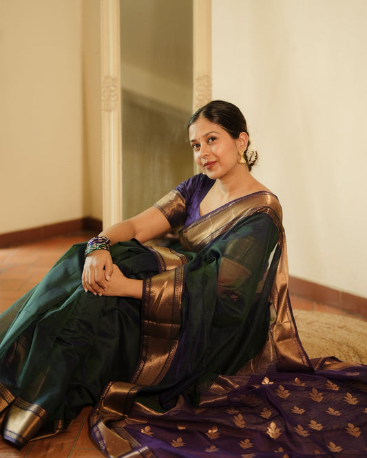 Peacock and purple dual tone Maheshwari saree with flower motifs on pallu