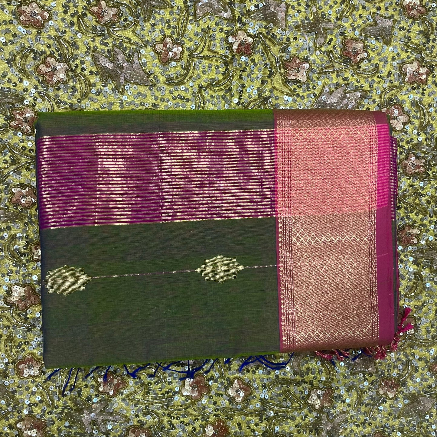 Green and pink dual tone Maheshwari saree with zari motifs all over