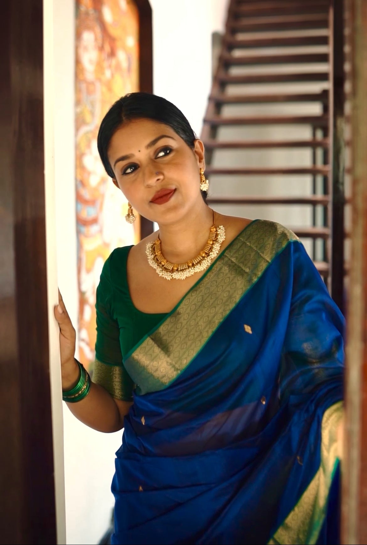 Dark blue & green maheshwari saree with zari pattern on pallu