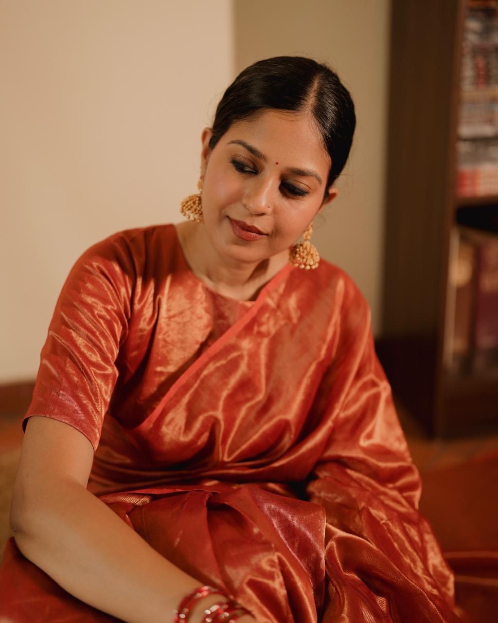 Red Maheshwari saree with zari lines all over